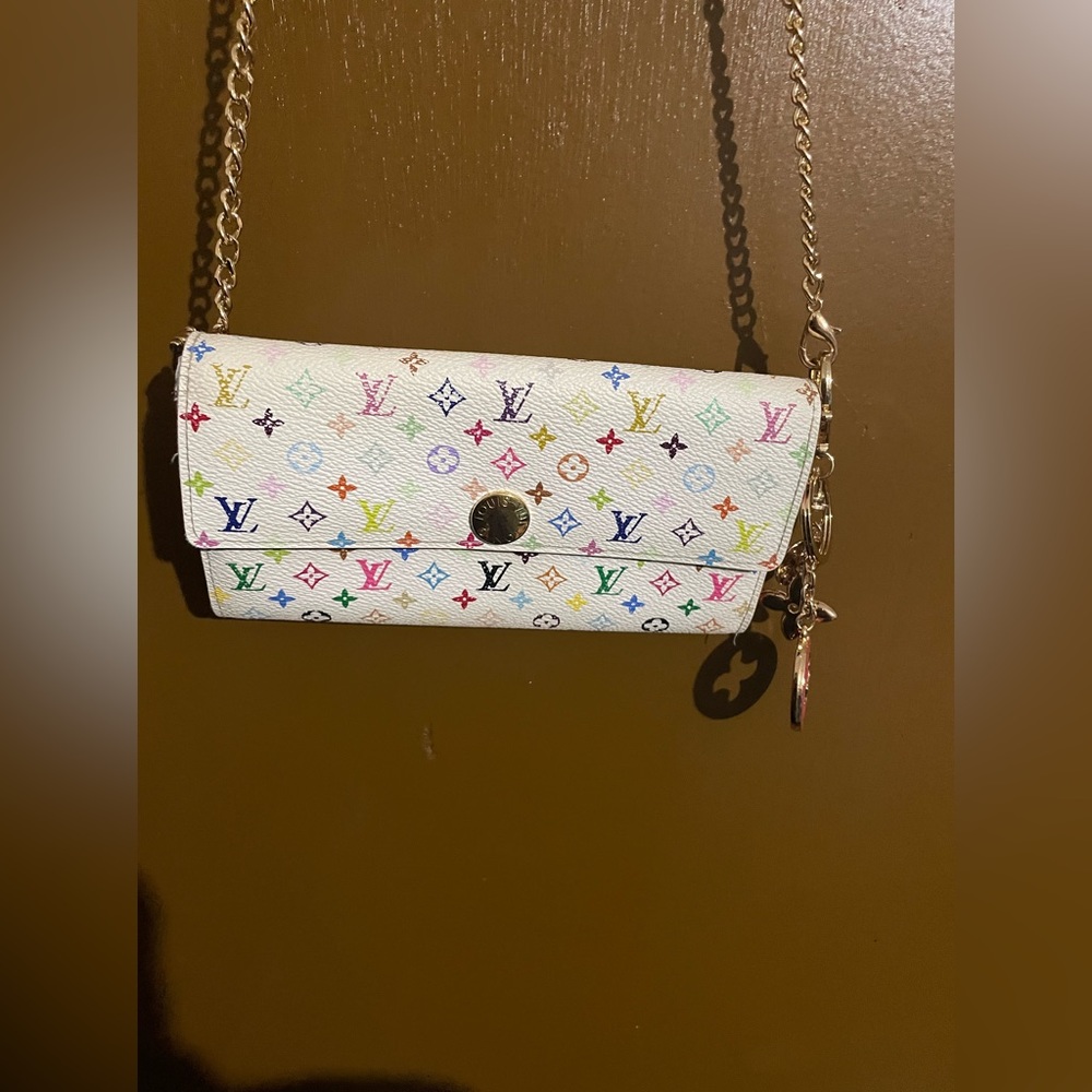 Authentic Louis Vuitton multicolored.  has been modified for crossbody chain.